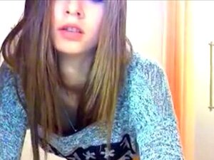 immature girl strips in front of a webcam
